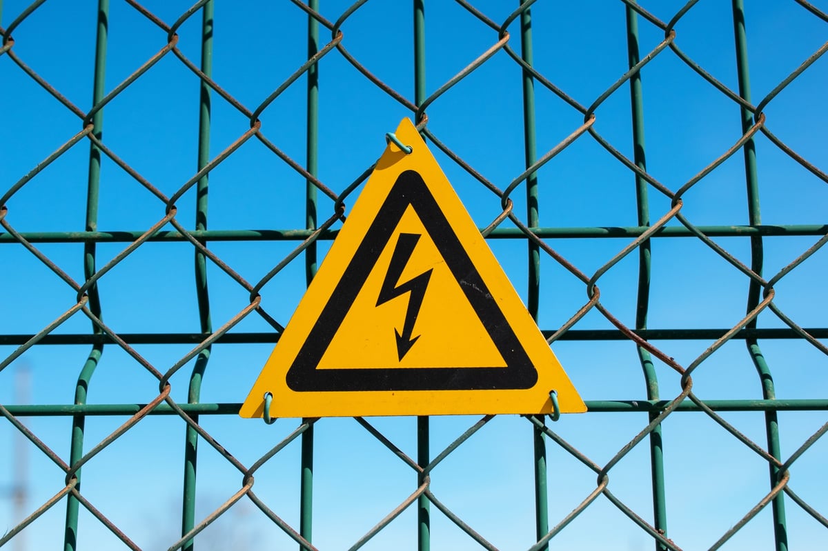 High Voltage Warning Sign on Chain-Link Fence